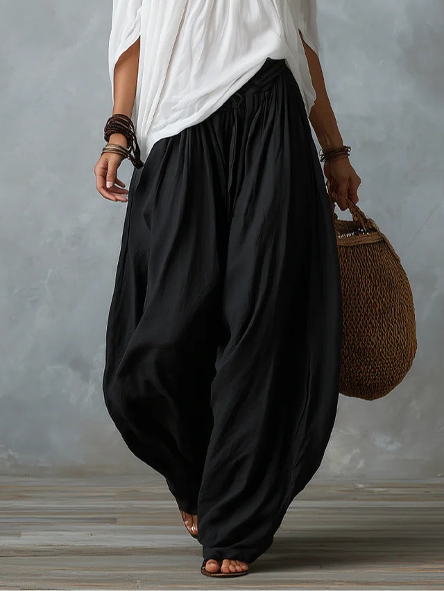 Damaris | Conjunto de Blusa Blanca con Hombros Descubiertos y Pantalón Palazzo Negro