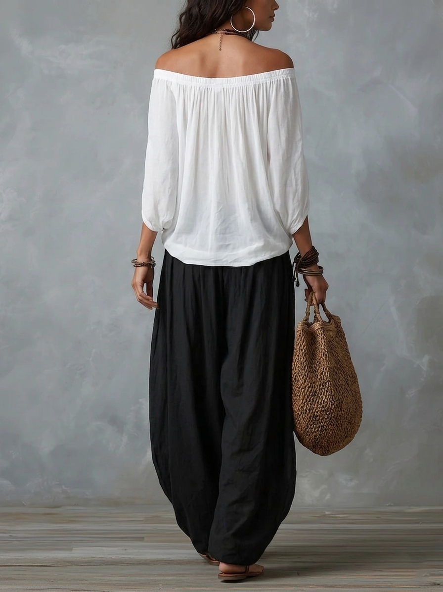 Damaris | Conjunto de Blusa Blanca con Hombros Descubiertos y Pantalón Palazzo Negro
