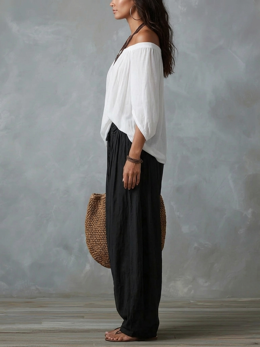 Damaris | Conjunto de Blusa Blanca con Hombros Descubiertos y Pantalón Palazzo Negro